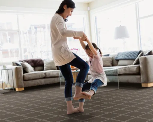 AfterCarpetInstall-Block Mom child playing together | Redd Flooring & Design Center